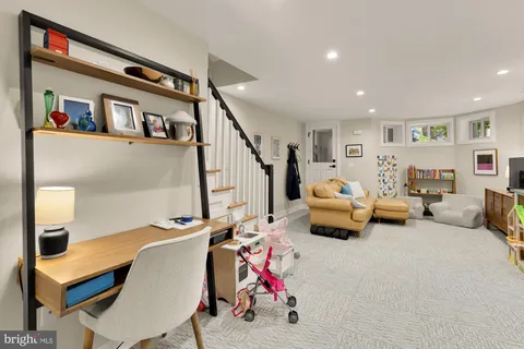 a bedroom with furniture or white walls