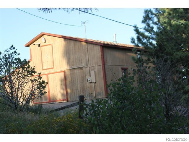 16750 Elk Ridge Road Littleton, CO 80127 - Photo 19 of 25 a backyard of a house