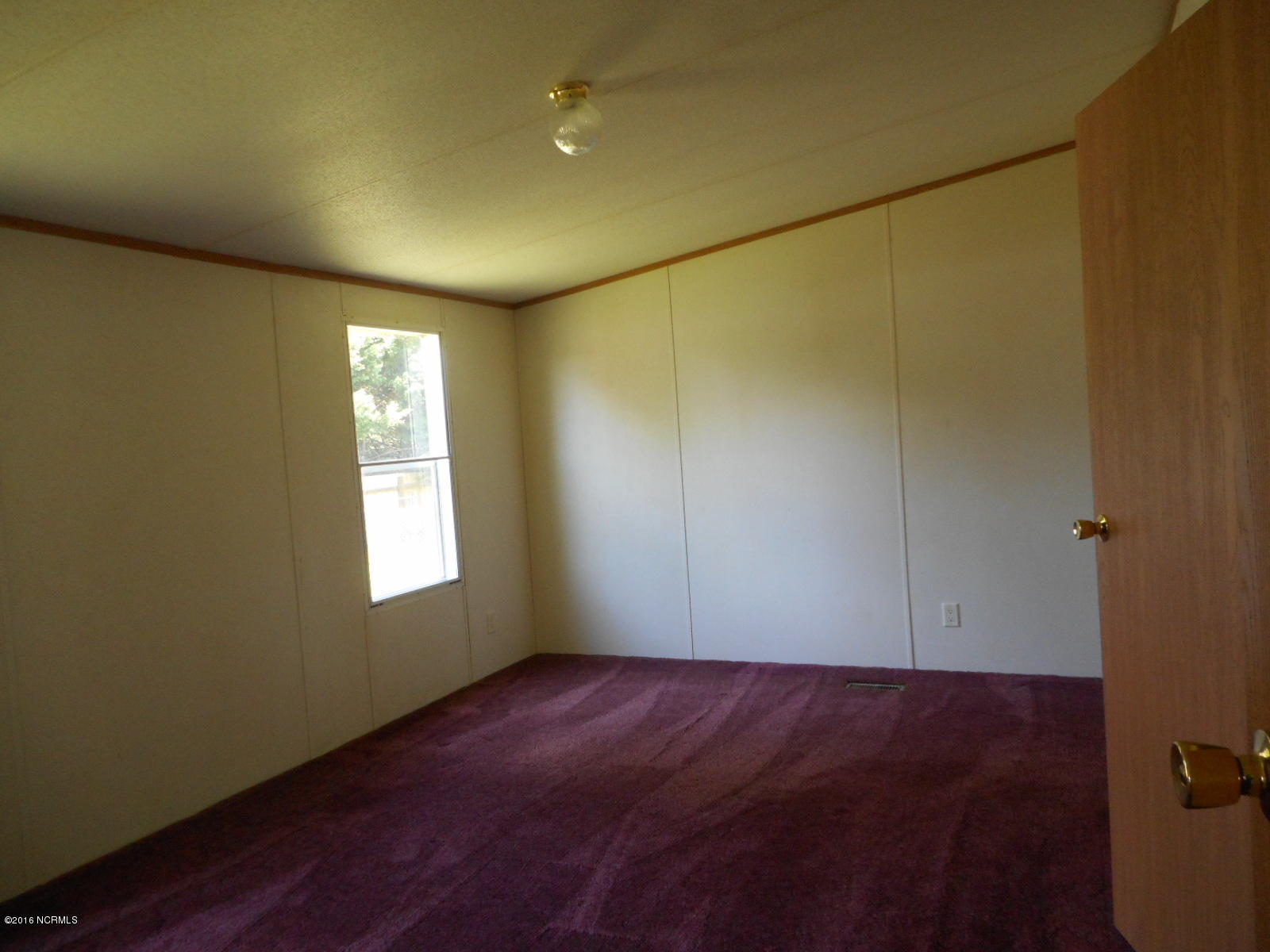 616 Nine Foot Road Newport, NC 28570 - Photo 12 of 46 Bedroom 1
