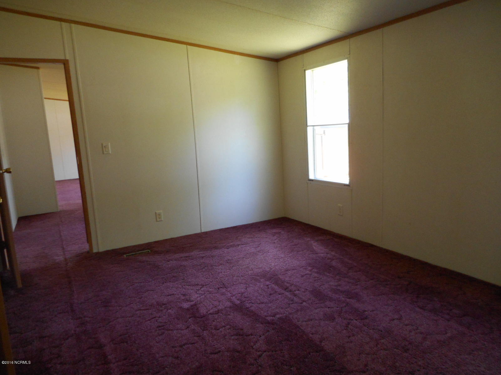 616 Nine Foot Road Newport, NC 28570 - Photo 14 of 46 Bedroom 1 a