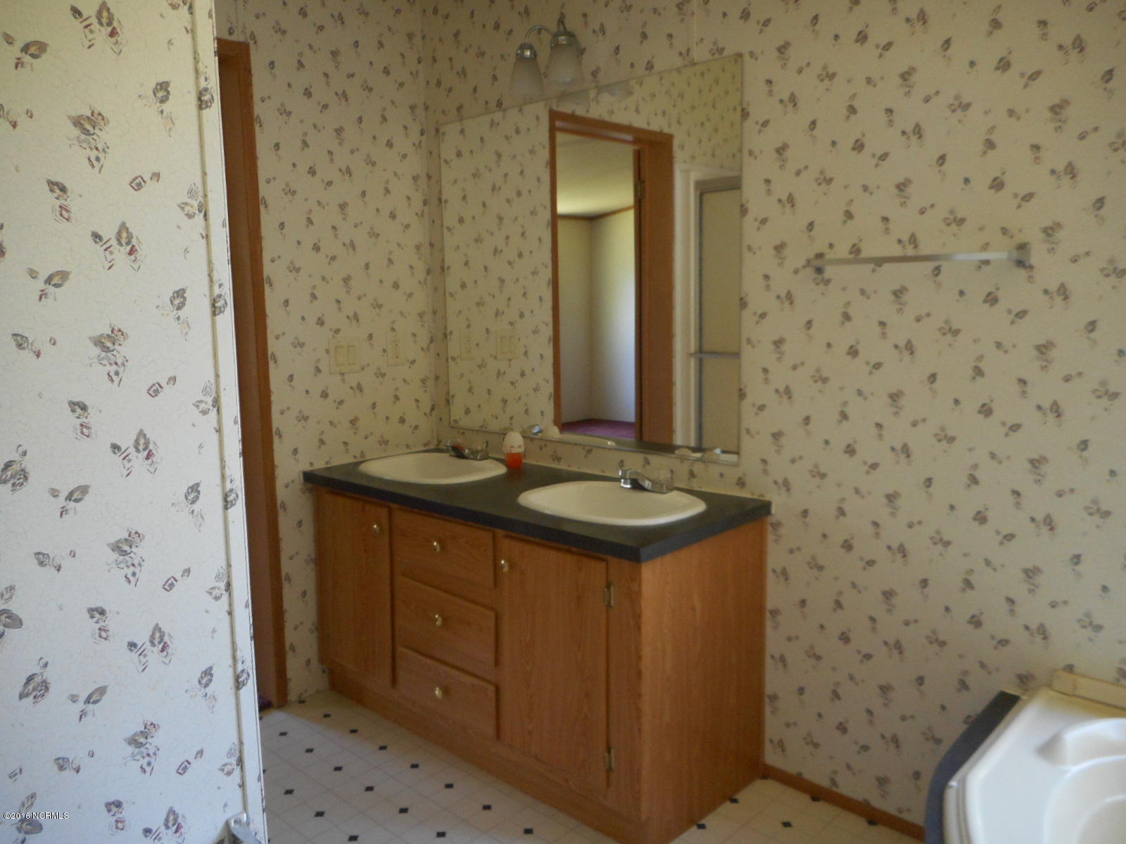 616 Nine Foot Road Newport, NC 28570 - Photo 18 of 46 Bedroom 1 Bath Vanity