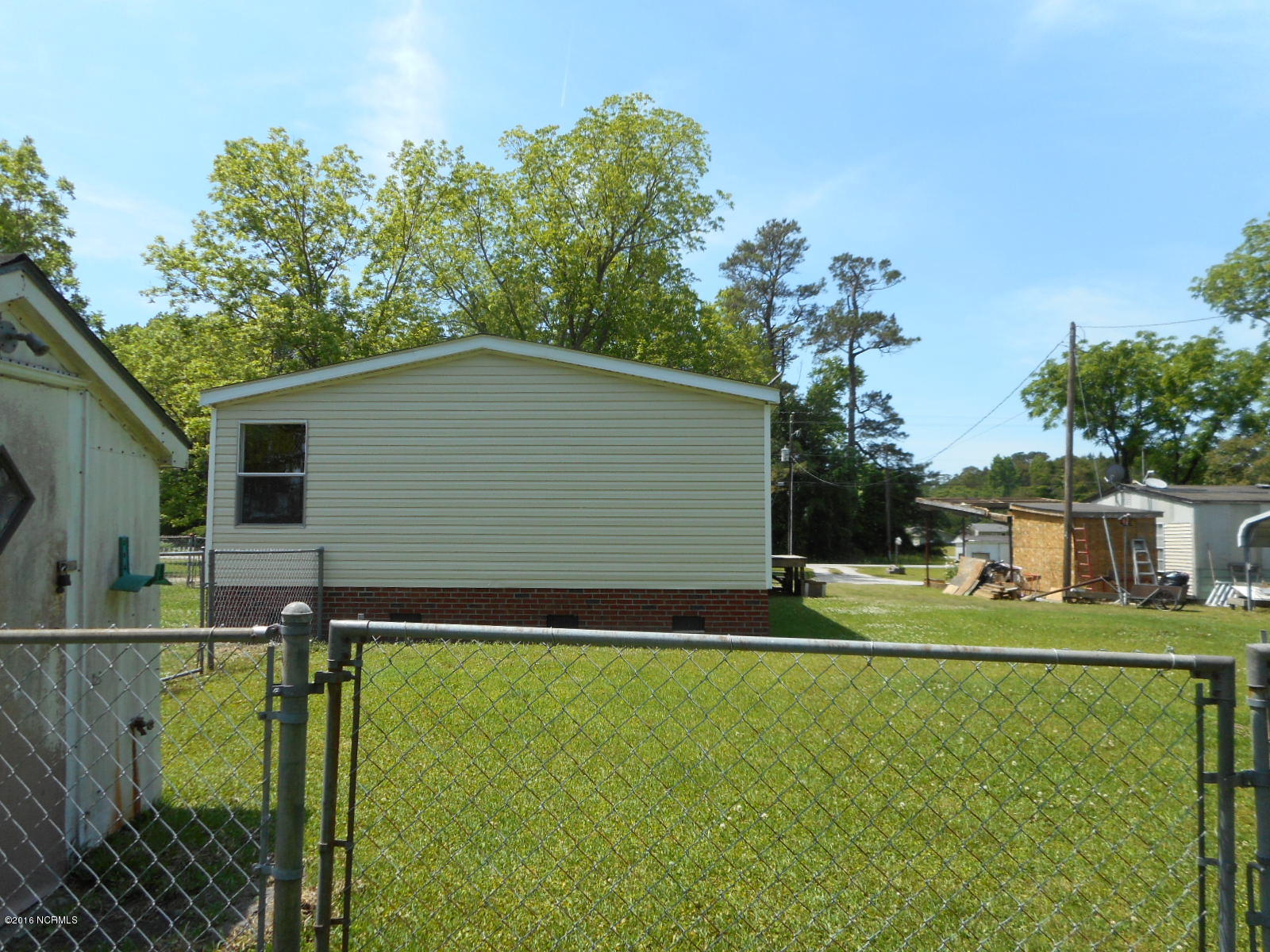 616 Nine Foot Road Newport, NC 28570 - Photo 38 of 46 Back Yard to Side