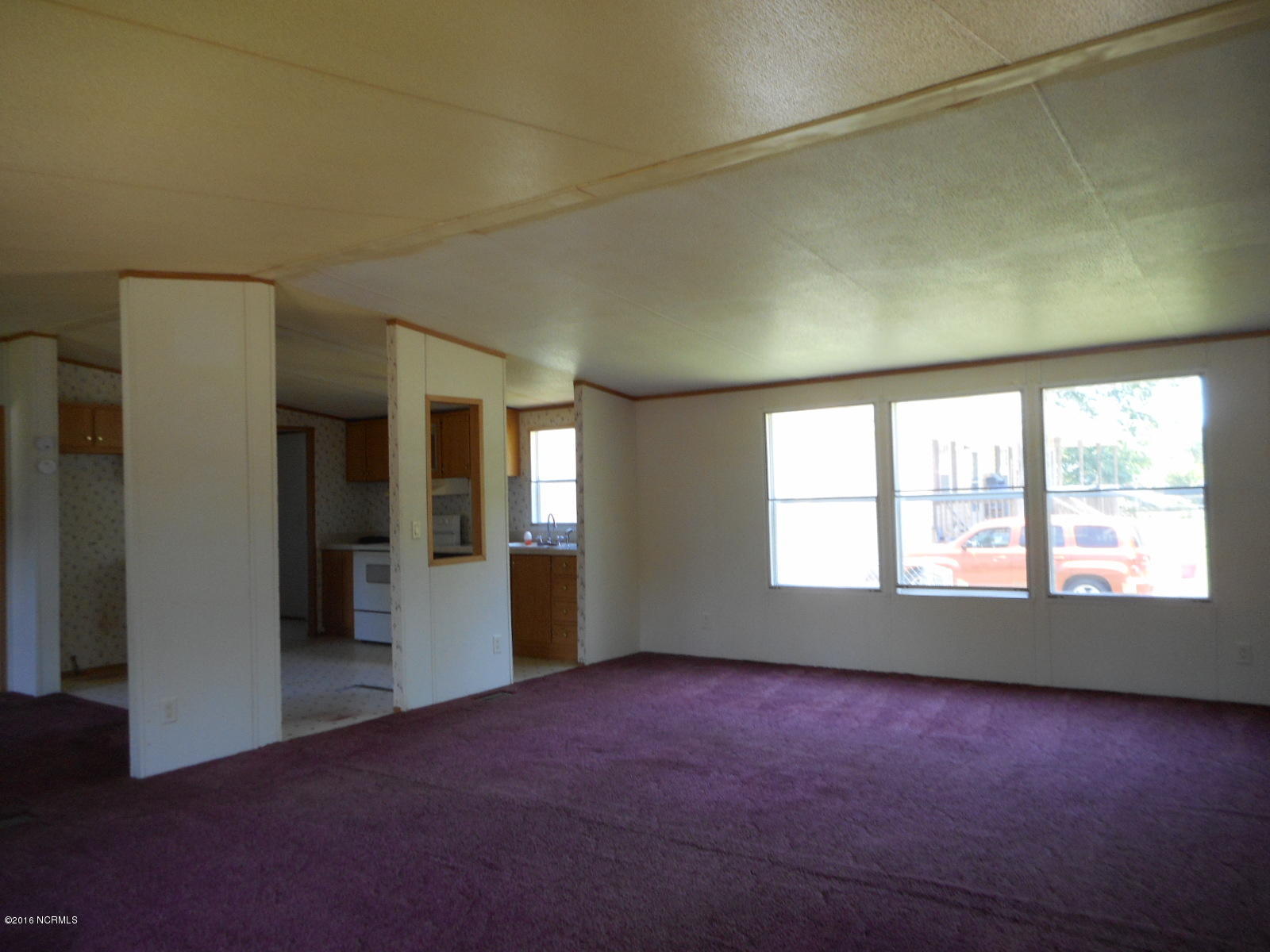 616 Nine Foot Road Newport, NC 28570 - Photo 7 of 46 Living Room towards Door