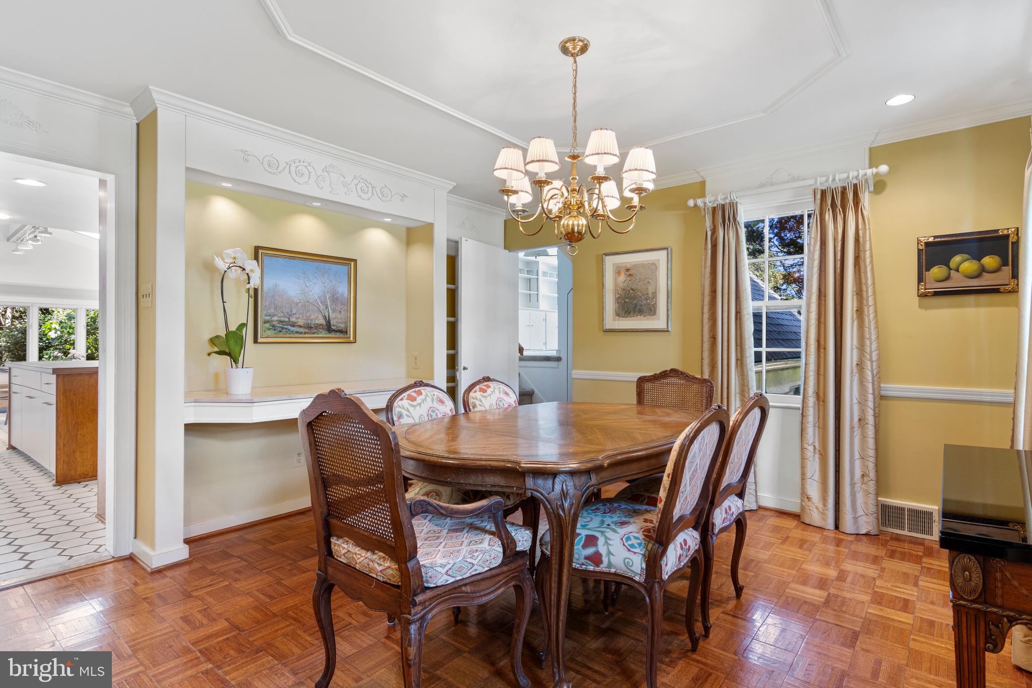 931 Hollow Road Wayne, PA 19087 - Photo 11 of 41 a view of a dining room with furniture and chandelier
