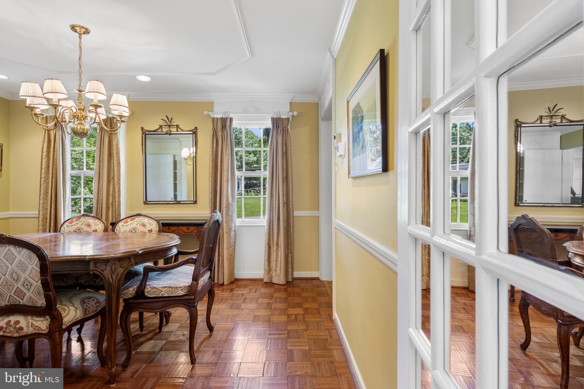 931 Hollow Road Wayne, PA 19087 - Photo 13 of 41 a view of a dining room with furniture and a chandelier
