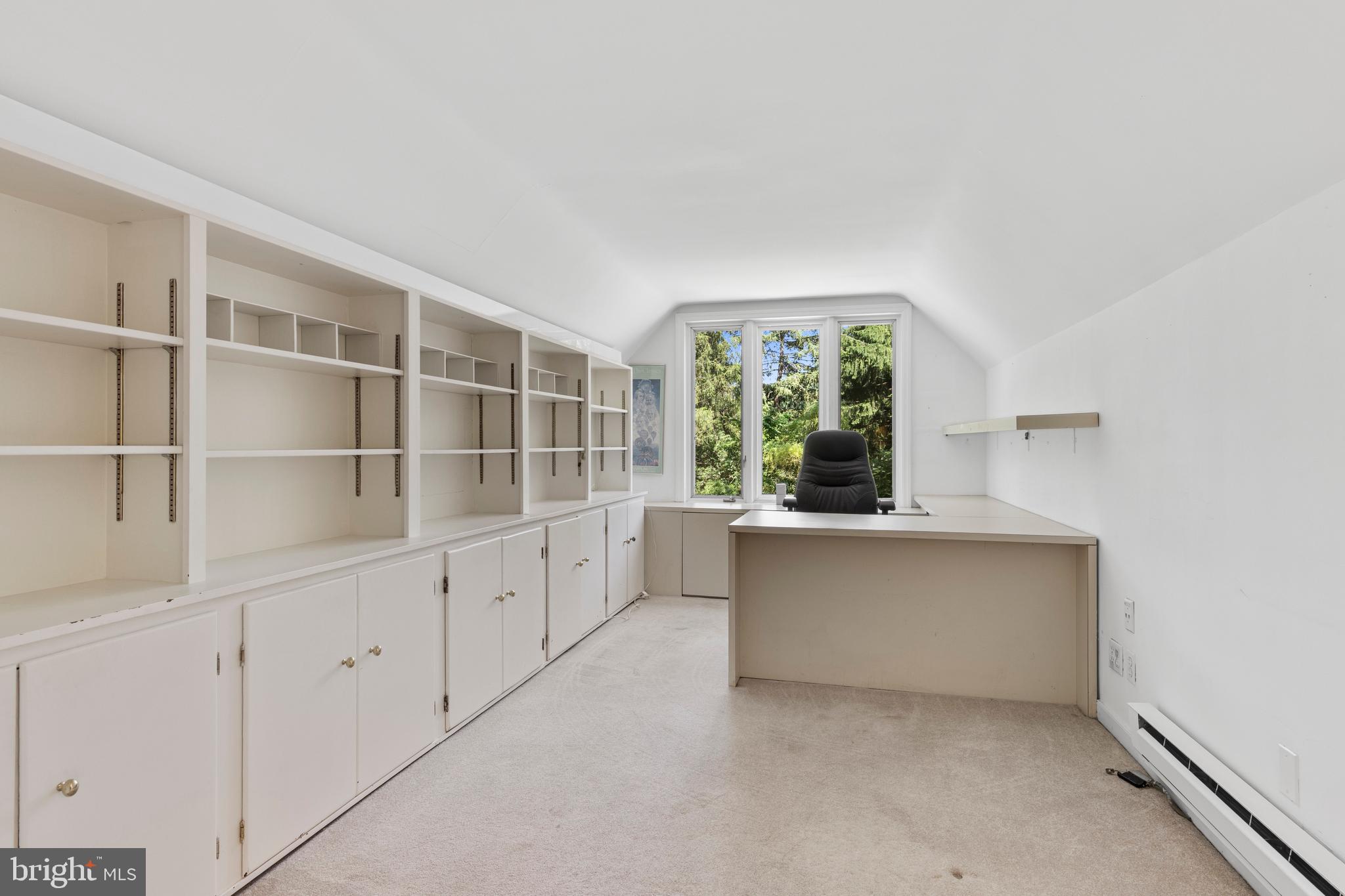 931 Hollow Road Wayne, PA 19087 - Photo 14 of 41 a kitchen with white cabinets and window