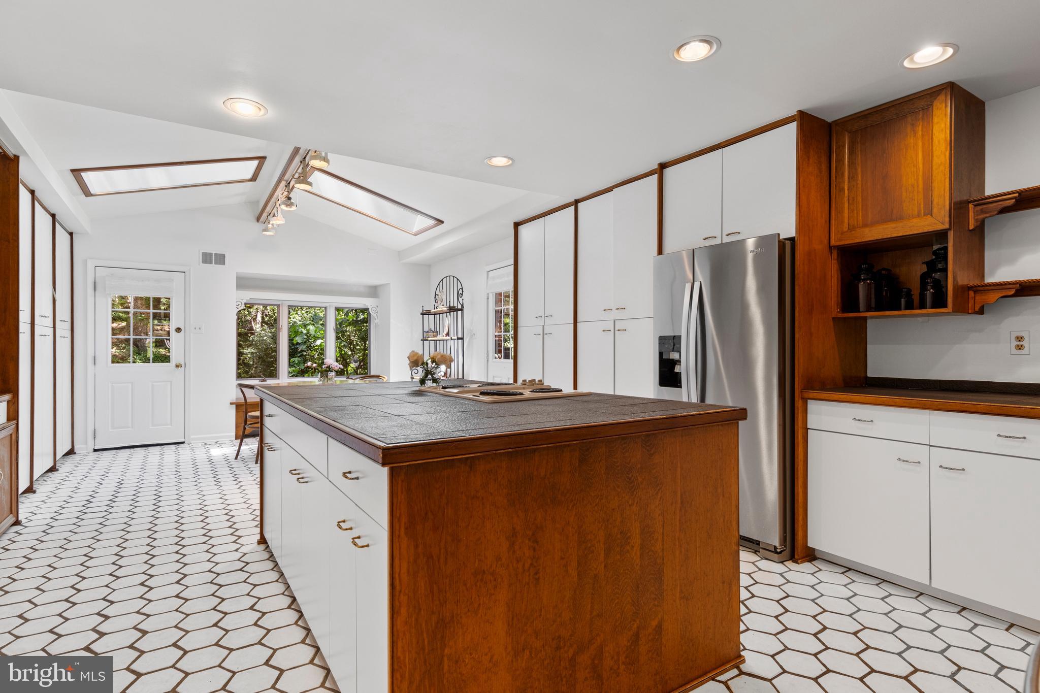 931 Hollow Road Wayne, PA 19087 - Photo 16 of 41 a kitchen with stainless steel appliances granite countertop a refrigerator and a sink