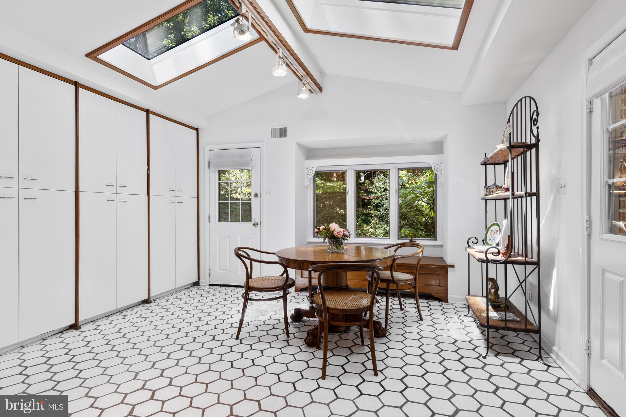 931 Hollow Road Wayne, PA 19087 - Photo 17 of 41 a dining room with furniture and window