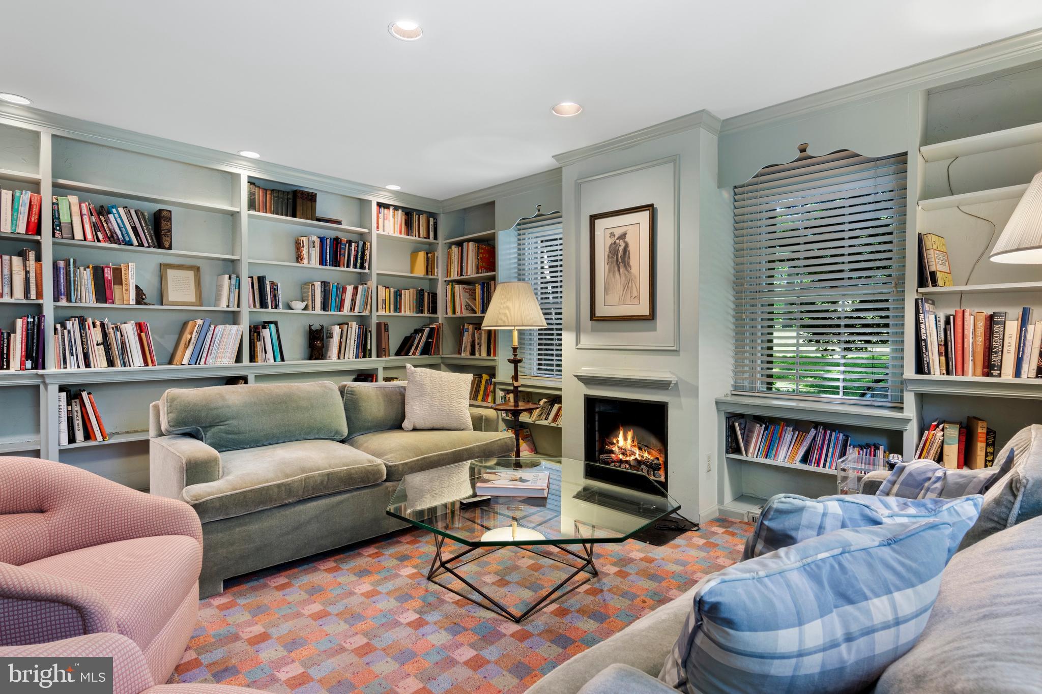931 Hollow Road Wayne, PA 19087 - Photo 19 of 41 a living room with furniture and a book shelf