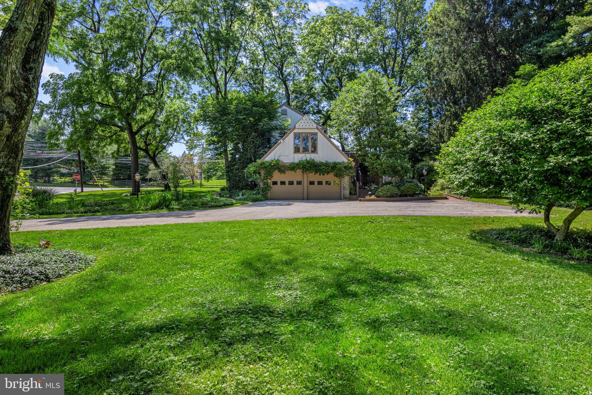 931 Hollow Road Wayne, PA 19087 - Photo 37 of 41 a front view of a house with a yard