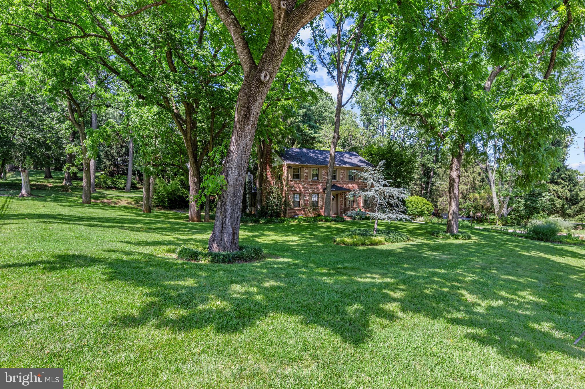 931 Hollow Road Wayne, PA 19087 - Photo 41 of 41 a backyard of a house with lots of green space