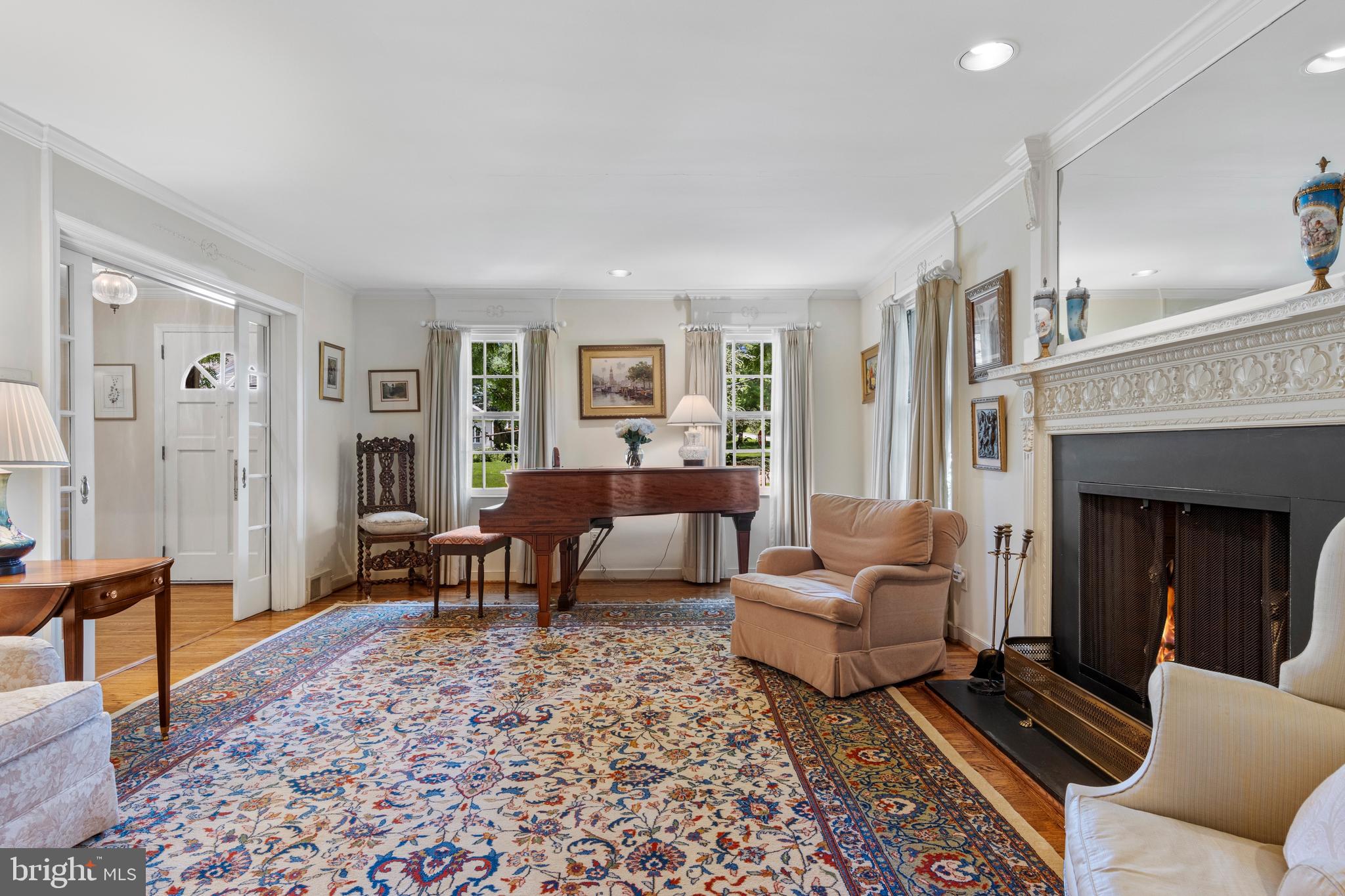 931 Hollow Road Wayne, PA 19087 - Photo 6 of 41 a living room with furniture and a fireplace