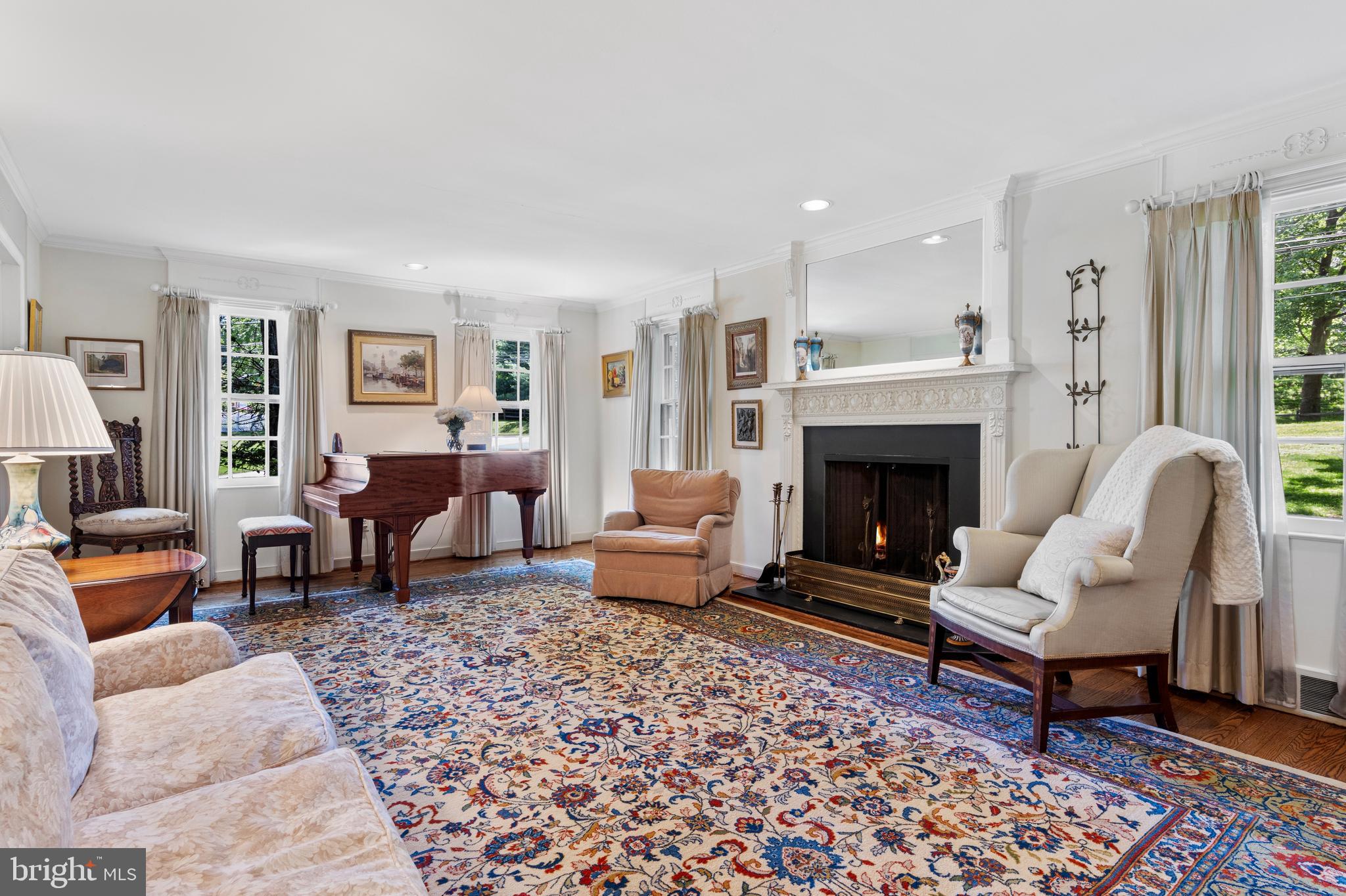931 Hollow Road Wayne, PA 19087 - Photo 7 of 41 a living room with furniture and a fireplace