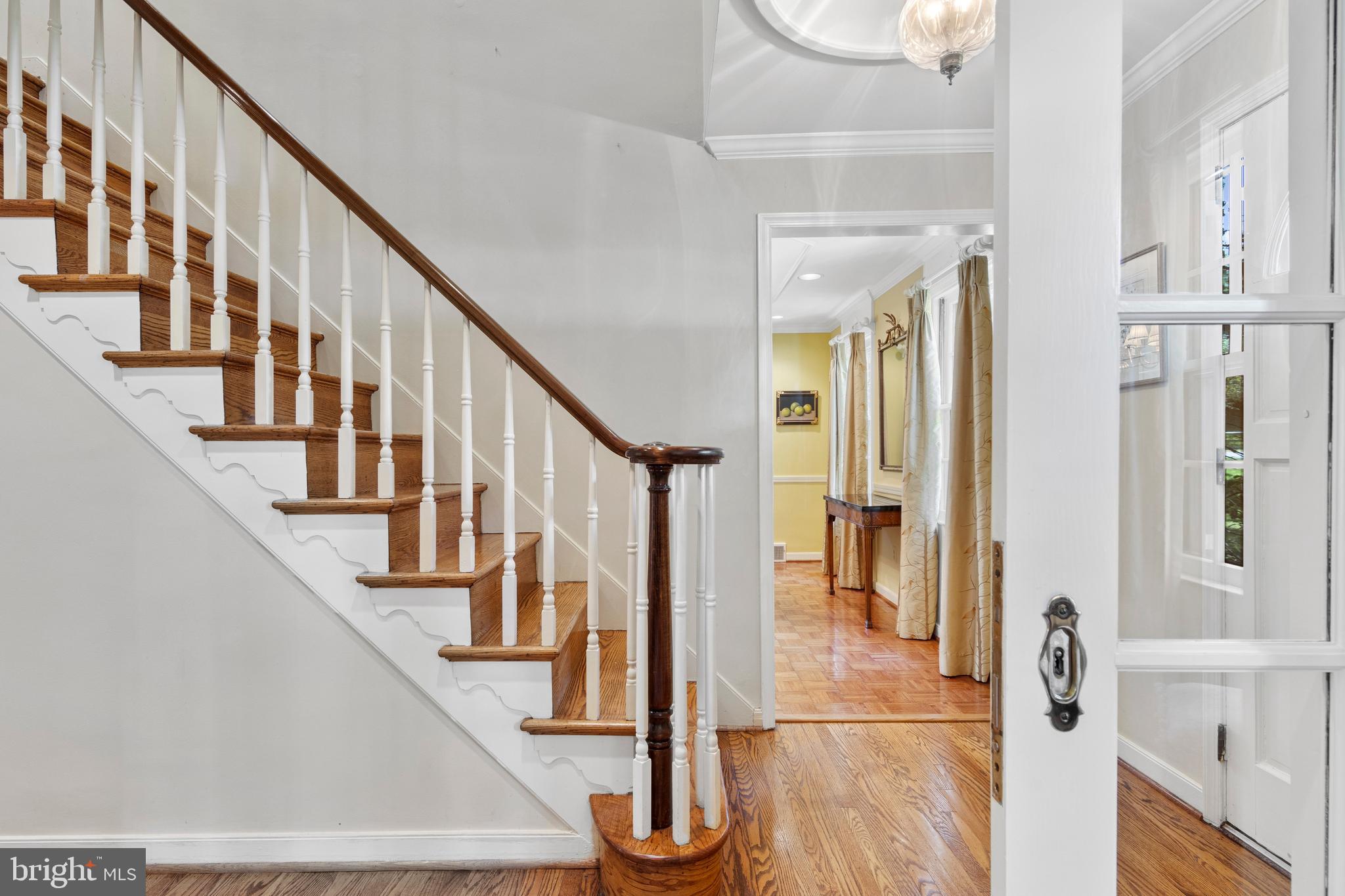 931 Hollow Road Wayne, PA 19087 - Photo 10 of 41 a view of staircase with lots of frames on wall and a window