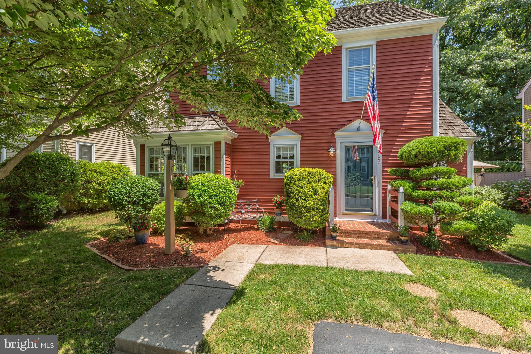 2102 Salt Kettle Way Reston, VA 20191 - Photo 2 of 22 a front view of a house with a yard
