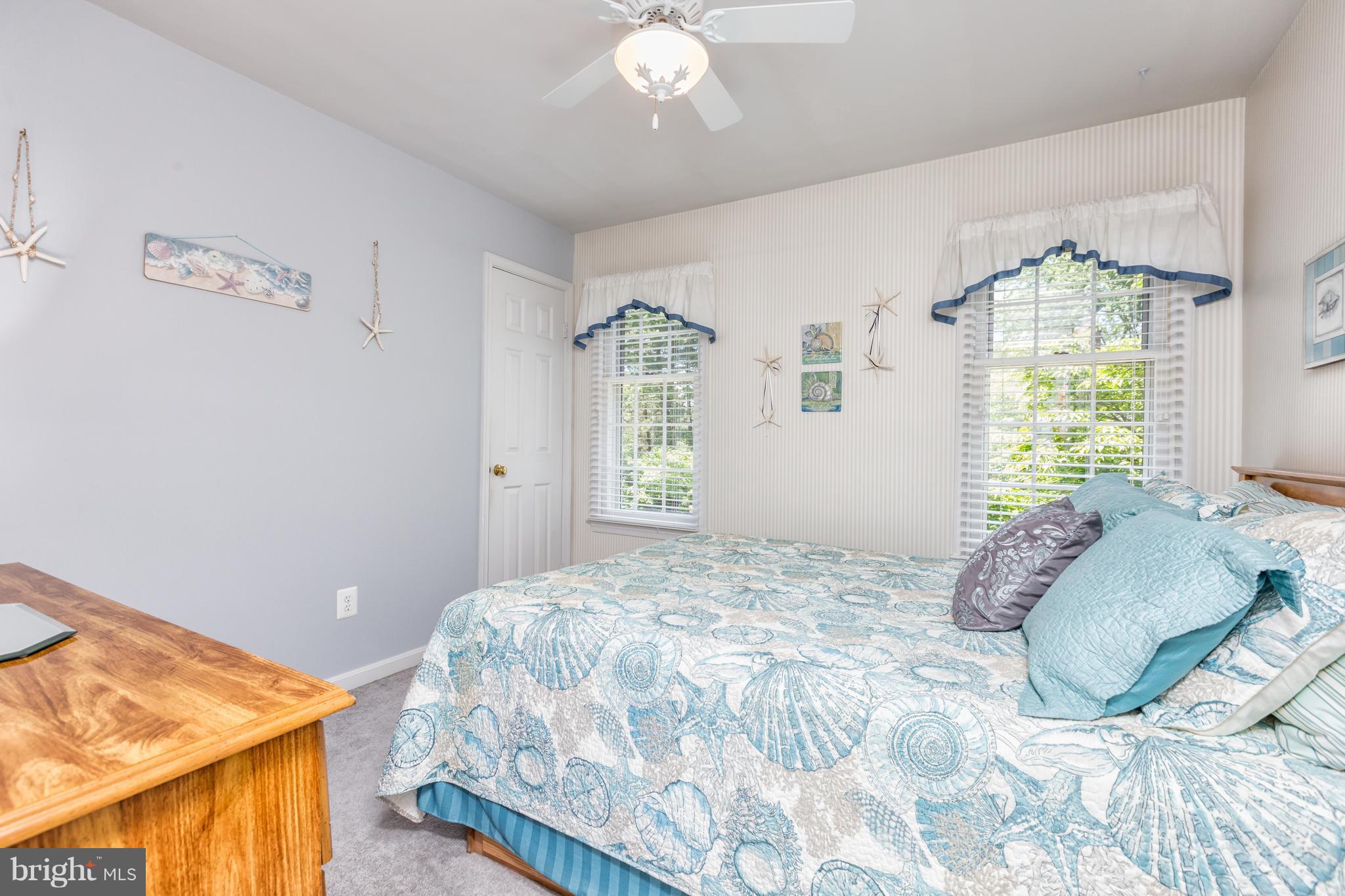 2102 Salt Kettle Way Reston, VA 20191 - Photo 12 of 22 a bedroom with a bed and a window