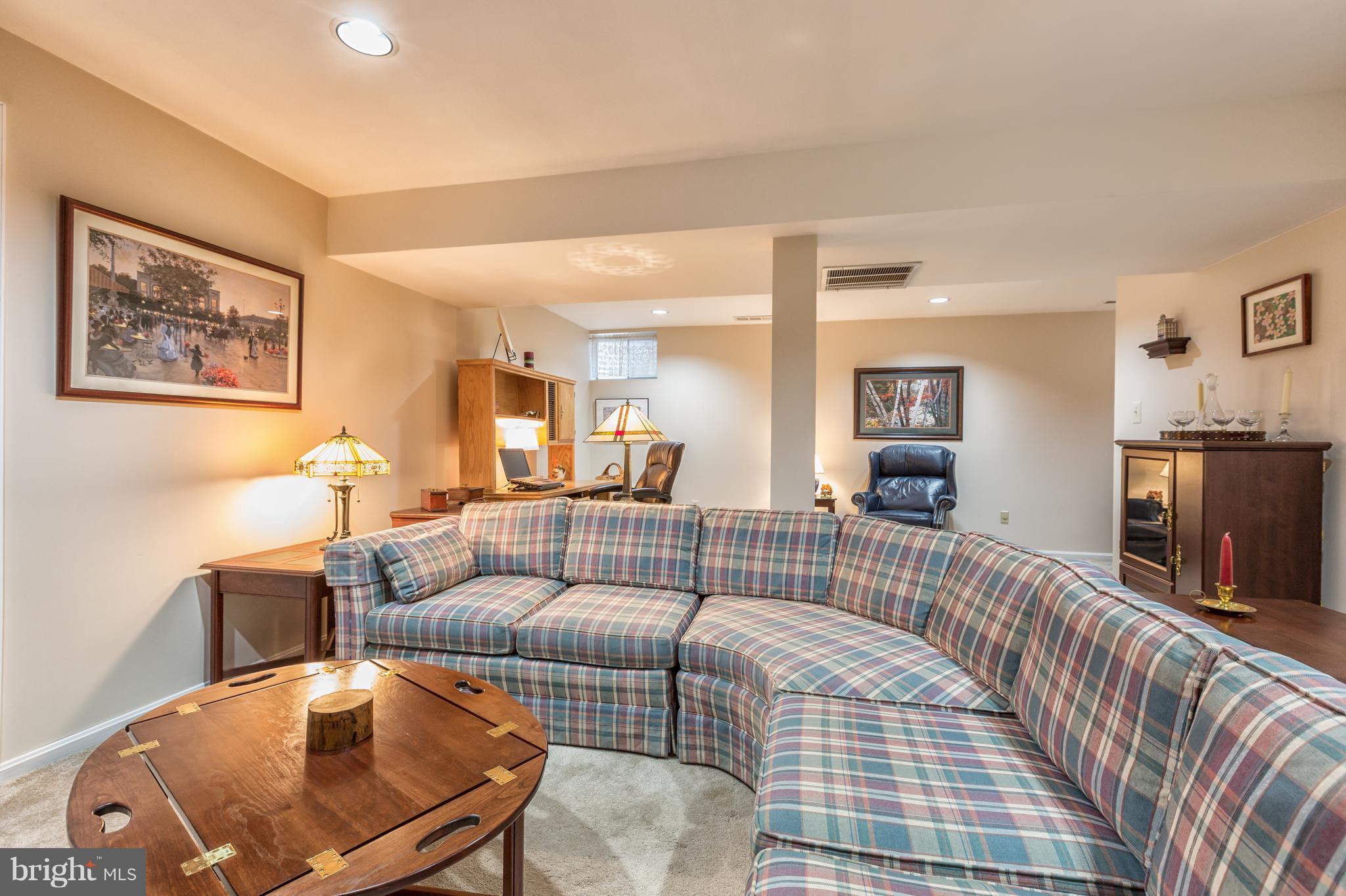 2102 Salt Kettle Way Reston, VA 20191 - Photo 15 of 22 a living room with furniture and a flat screen tv