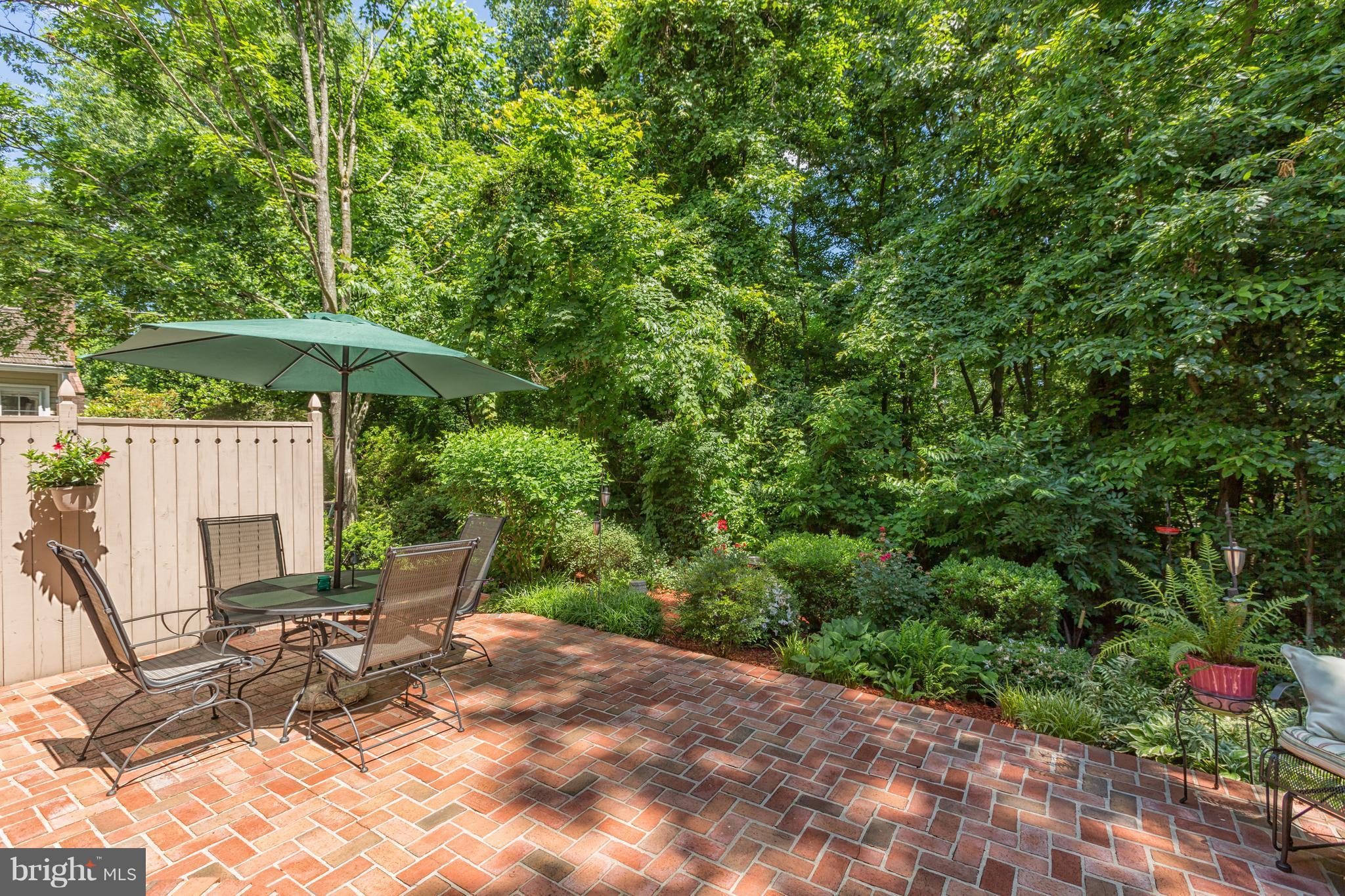 2102 Salt Kettle Way Reston, VA 20191 - Photo 20 of 22 a view of backyard with outdoor seating and trees