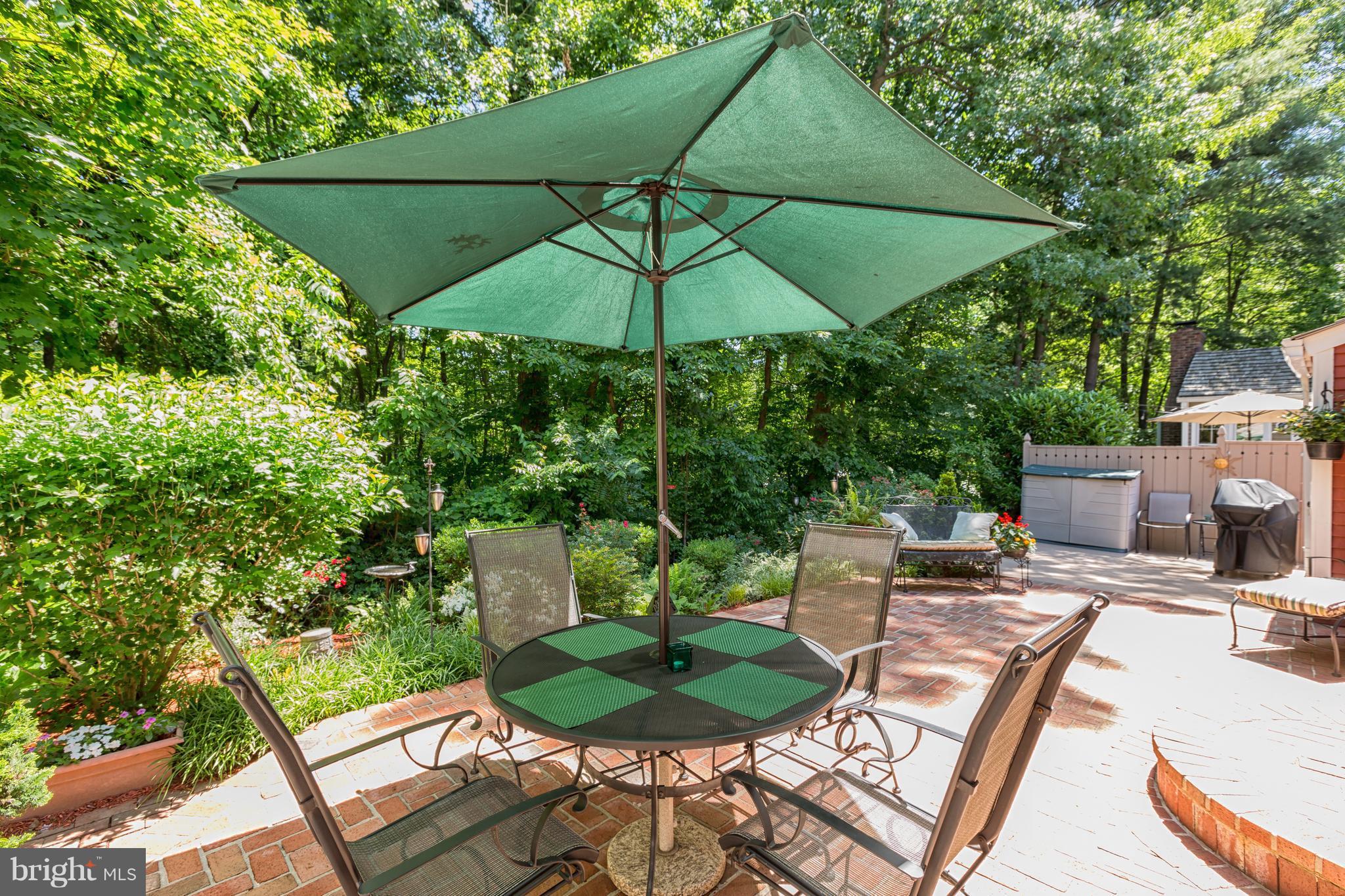 2102 Salt Kettle Way Reston, VA 20191 - Photo 21 of 22 a patio with a patio table and chairs