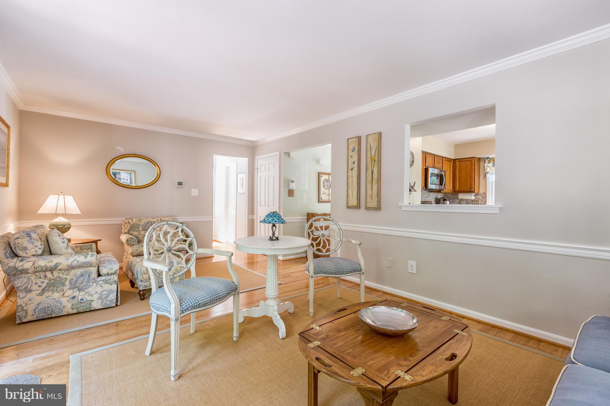 2102 Salt Kettle Way Reston, VA 20191 - Photo 5 of 22 a living room with furniture and a wooden floor