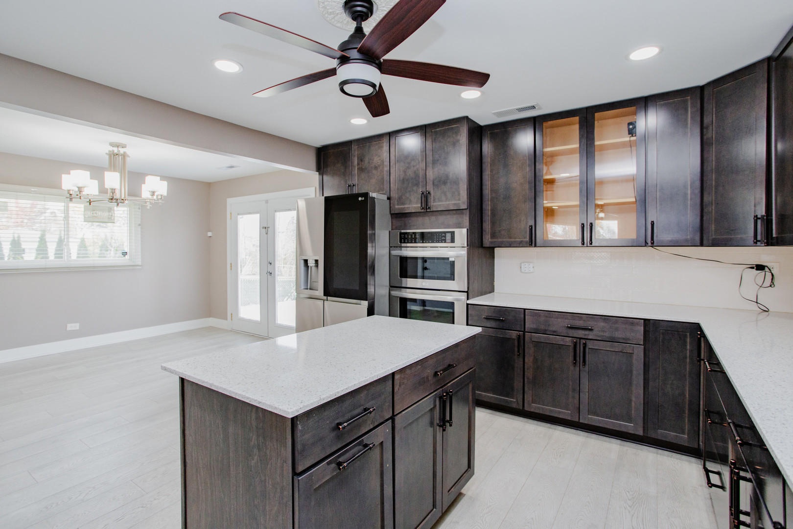 720 Durham Lane Hoffman Estates, IL 60169 - Photo 9 of 32 a kitchen with stainless steel appliances granite countertop a refrigerator a sink and a stove