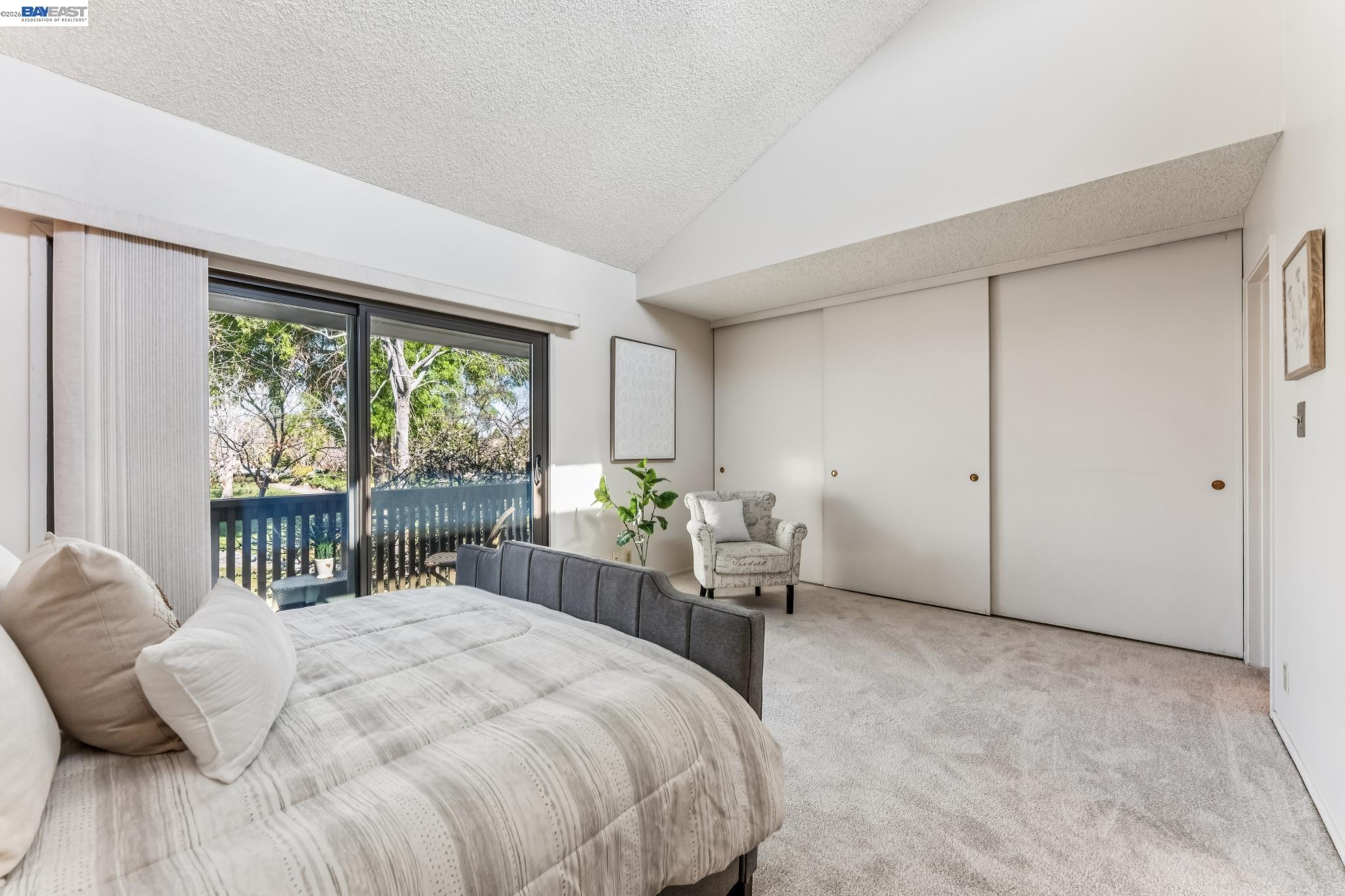 1149 Bismarck Lane Alameda, CA 94502 - Photo 21 of 57 a bedroom with a bed and a large window