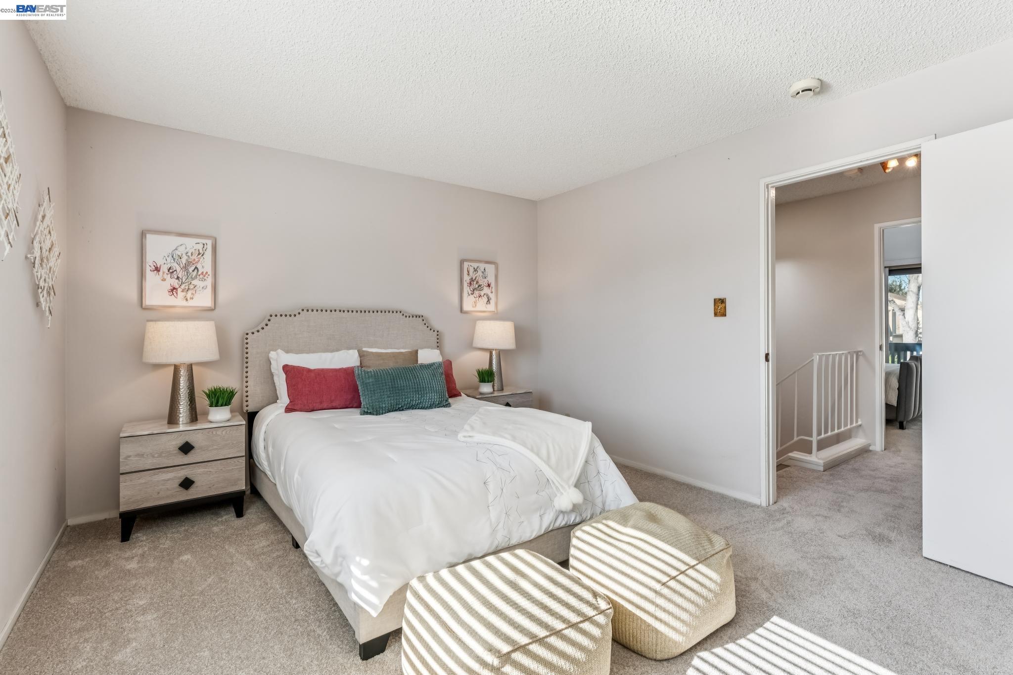 1149 Bismarck Lane Alameda, CA 94502 - Photo 22 of 57 a bedroom with a bed and a cabinets
