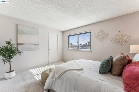 a en suite bathroom with a sink and a mirror