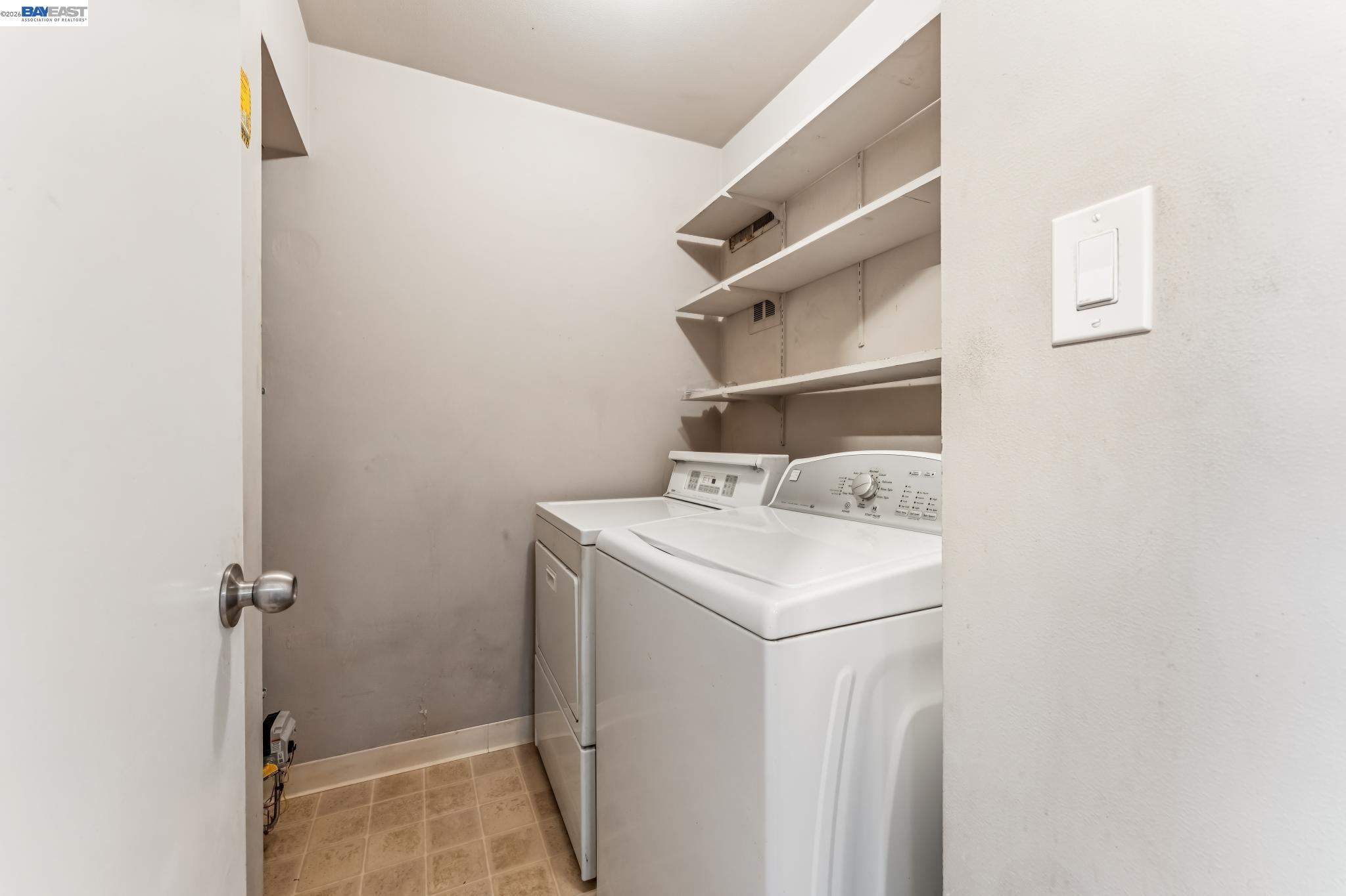 1149 Bismarck Lane Alameda, CA 94502 - Photo 32 of 57 a utility room with dryer and washer