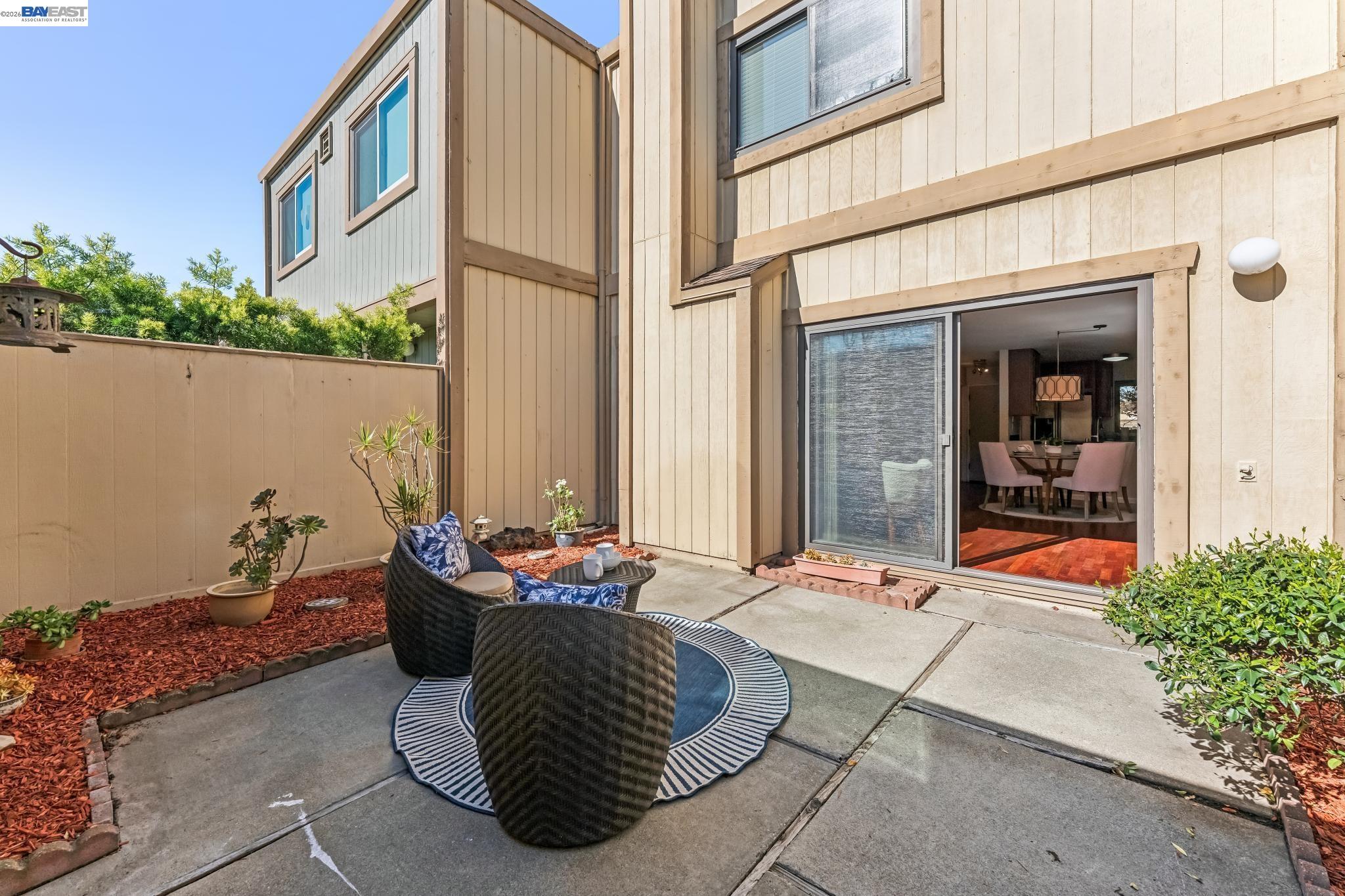 1149 Bismarck Lane Alameda, CA 94502 - Photo 35 of 57 a outdoor space with lounge chair and glass windows