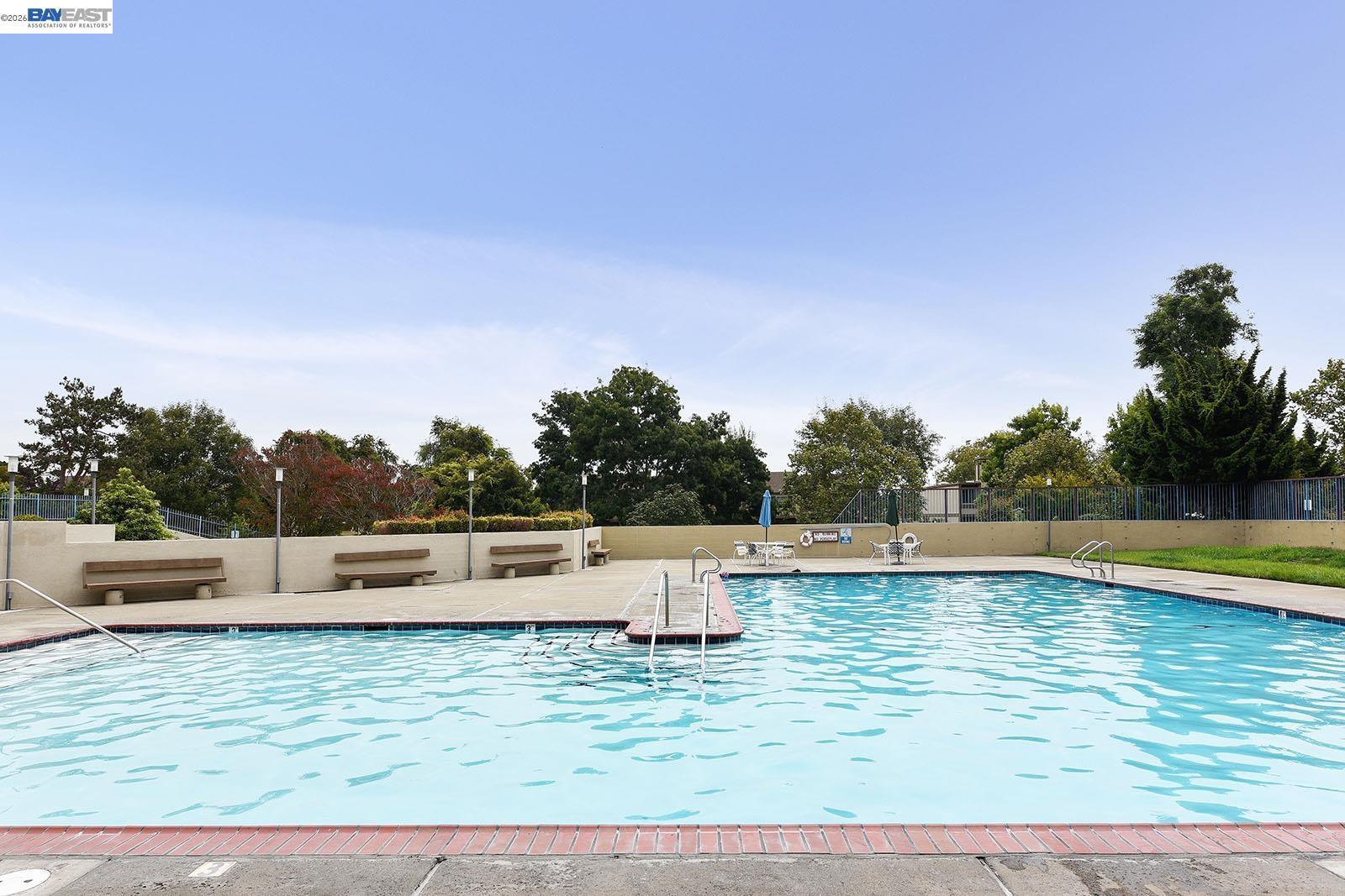 1149 Bismarck Lane Alameda, CA 94502 - Photo 52 of 57 a view of a swimming pool with an outdoor seating