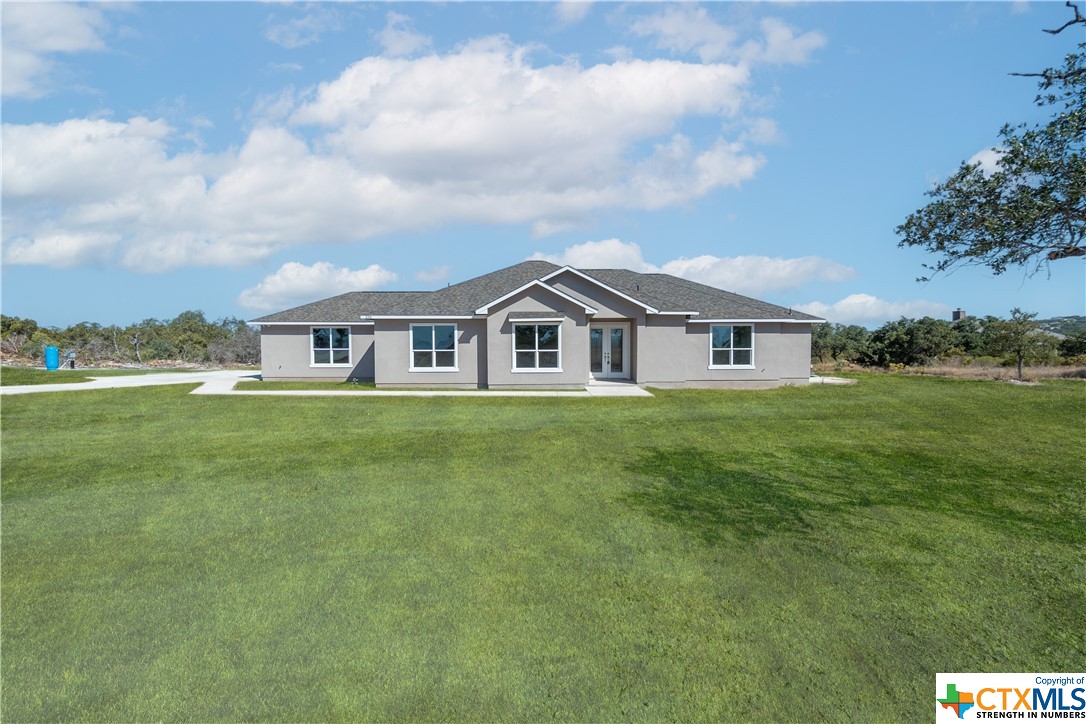 a house view with garden space