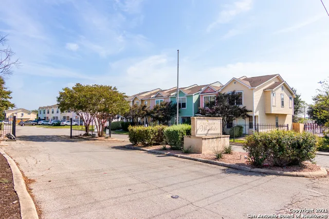 a view of a street with houses