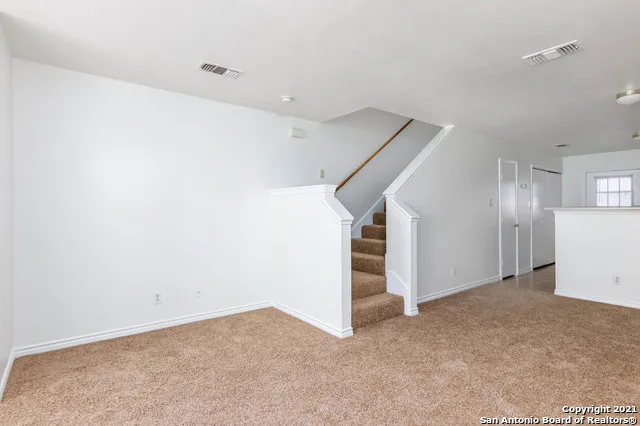 a view of a kitchen with a sink