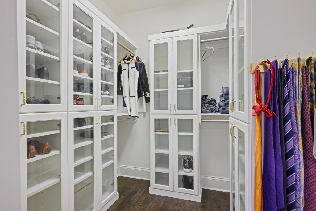 3601 Habersham Road Northwest Atlanta, GA 30305 - Photo 20 of 34 a view of walk in closet with clothes and shoes