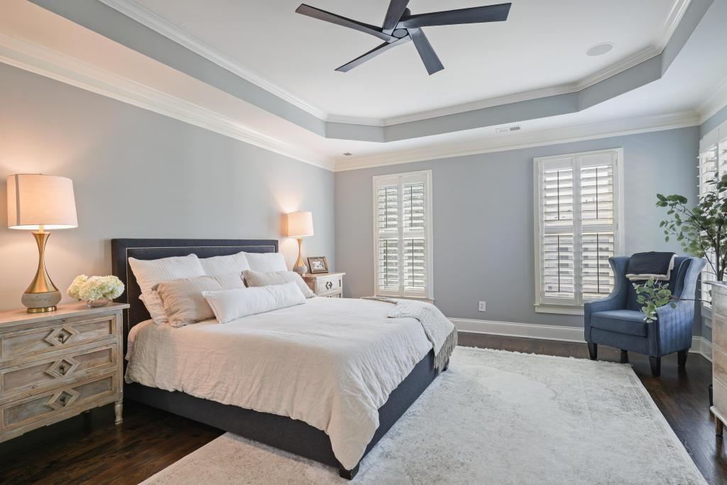 3601 Habersham Road Northwest Atlanta, GA 30305 - Photo 28 of 34 a bedroom with a bed and furniture