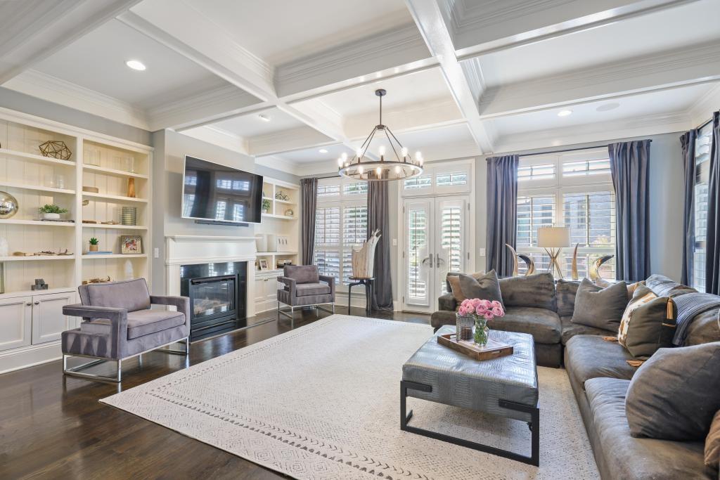 3601 Habersham Road Northwest Atlanta, GA 30305 - Photo 5 of 34 a living room with furniture fireplace and large windows
