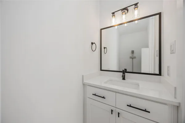 a view of hallway with wooden floor