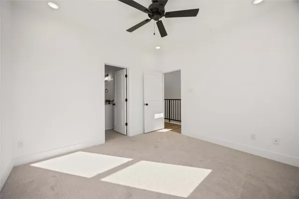 a bathroom with a tub a toilet and a sink