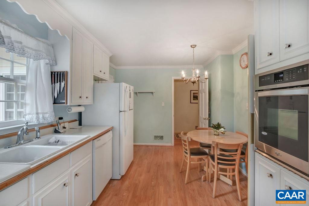 103 Surrey Road Charlottesville, VA 22901 - Photo 15 of 28 a kitchen with a sink stove and refrigerator