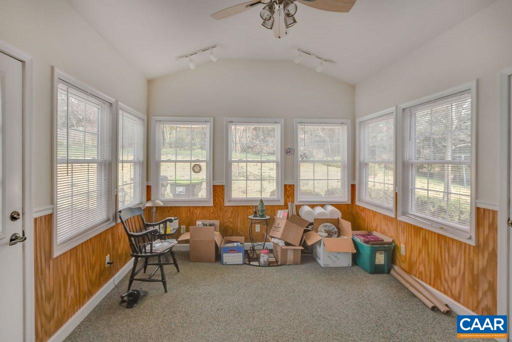 103 Surrey Road Charlottesville, VA 22901 - Photo 16 of 28 a bedroom with furniture and large windows