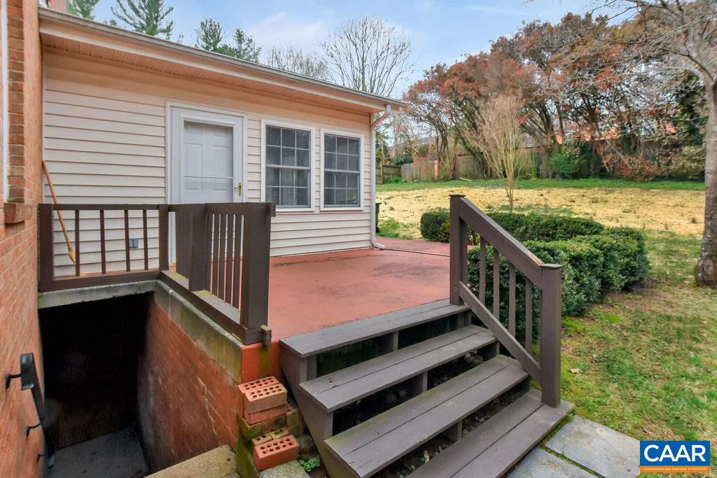 103 Surrey Road Charlottesville, VA 22901 - Photo 27 of 28 a view of a wooden deck and a yard