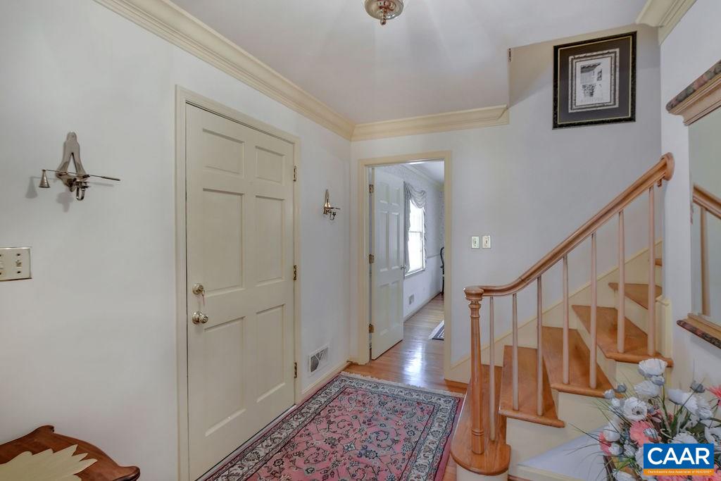 103 Surrey Road Charlottesville, VA 22901 - Photo 5 of 28 a view of entryway with wooden floor