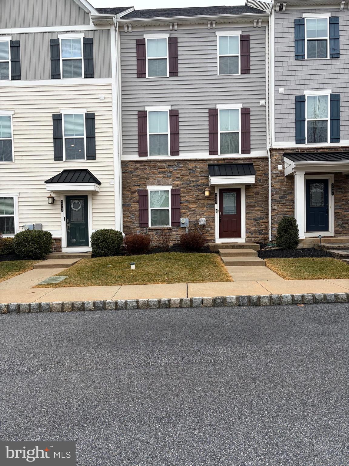 225 Quarry Point Road Malvern, PA 19355 - Photo 1 of 19 a view of a building with a swimming pool