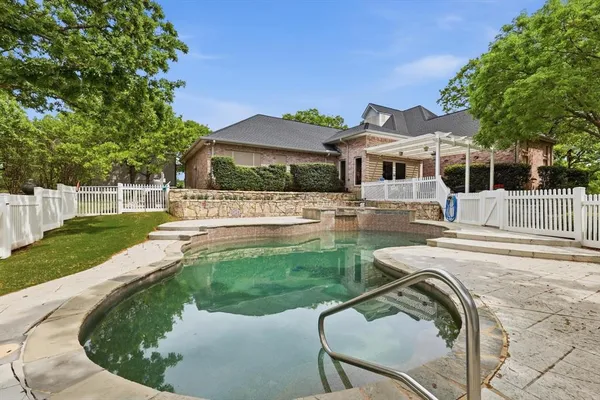 a view of a house with a swimming pool