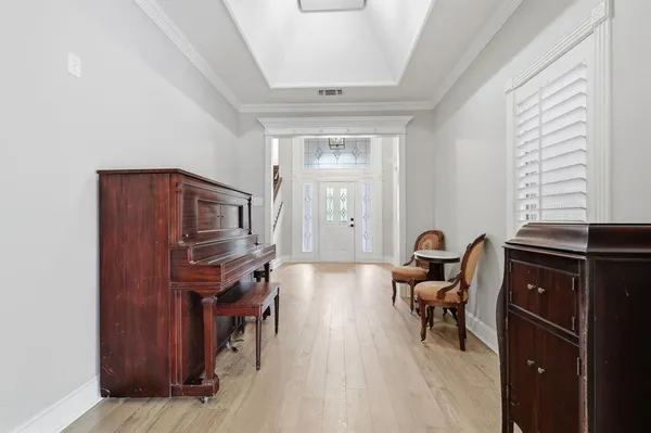 a view of a workspace with furniture and lounge chair