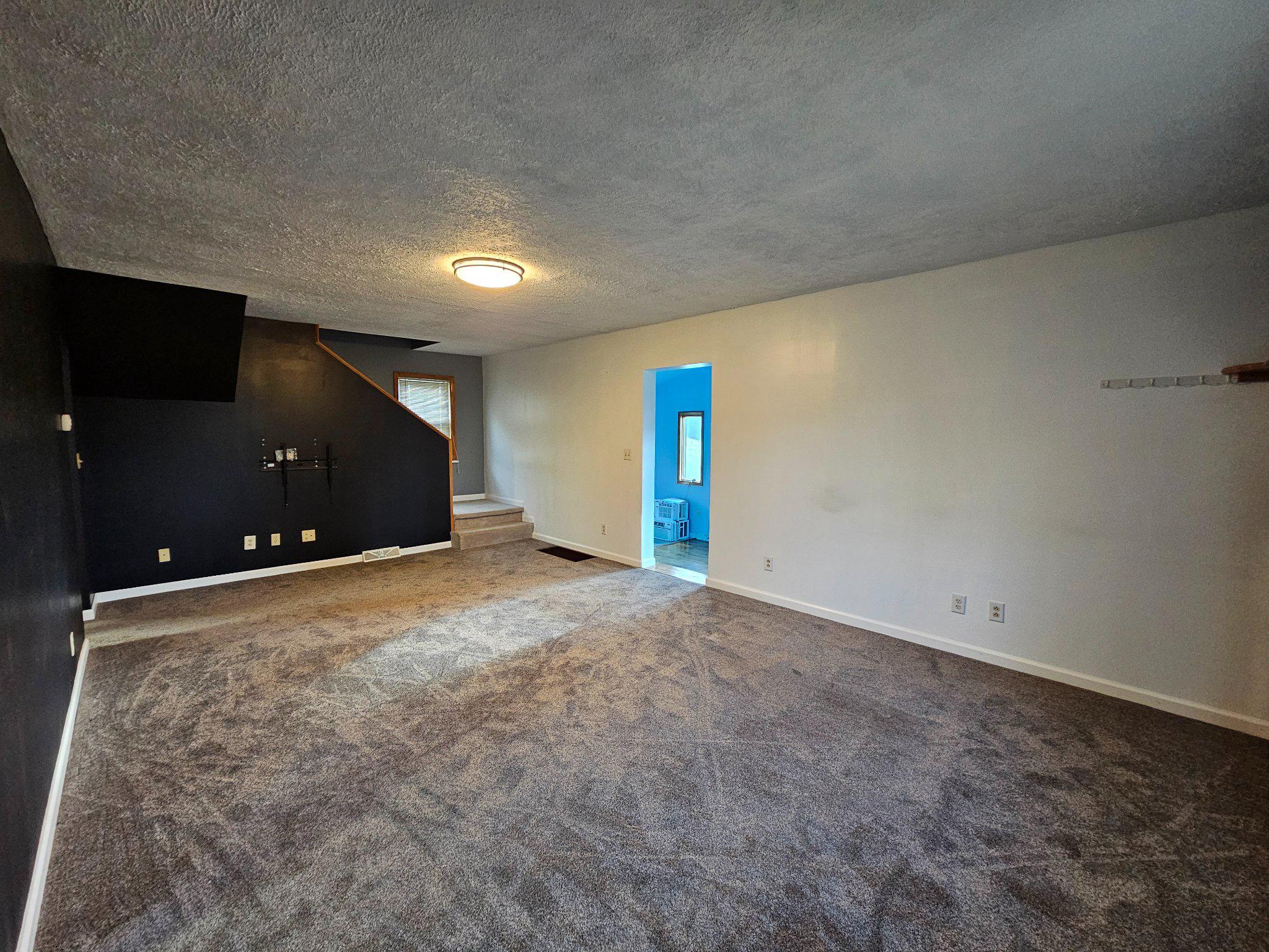 1967 Hyndman Road Hyndman, PA 15545 - Photo 22 of 41 Spacious living room with modern charm.