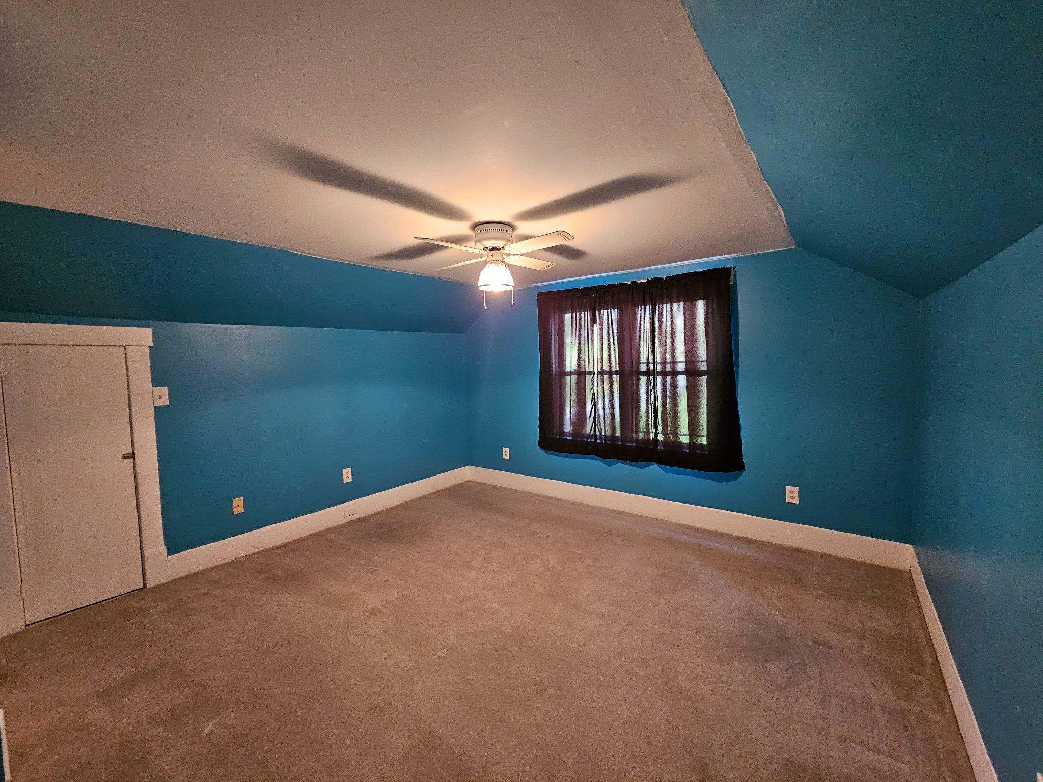1967 Hyndman Road Hyndman, PA 15545 - Photo 28 of 41 Vibrant blue bedroom with cozy charm.