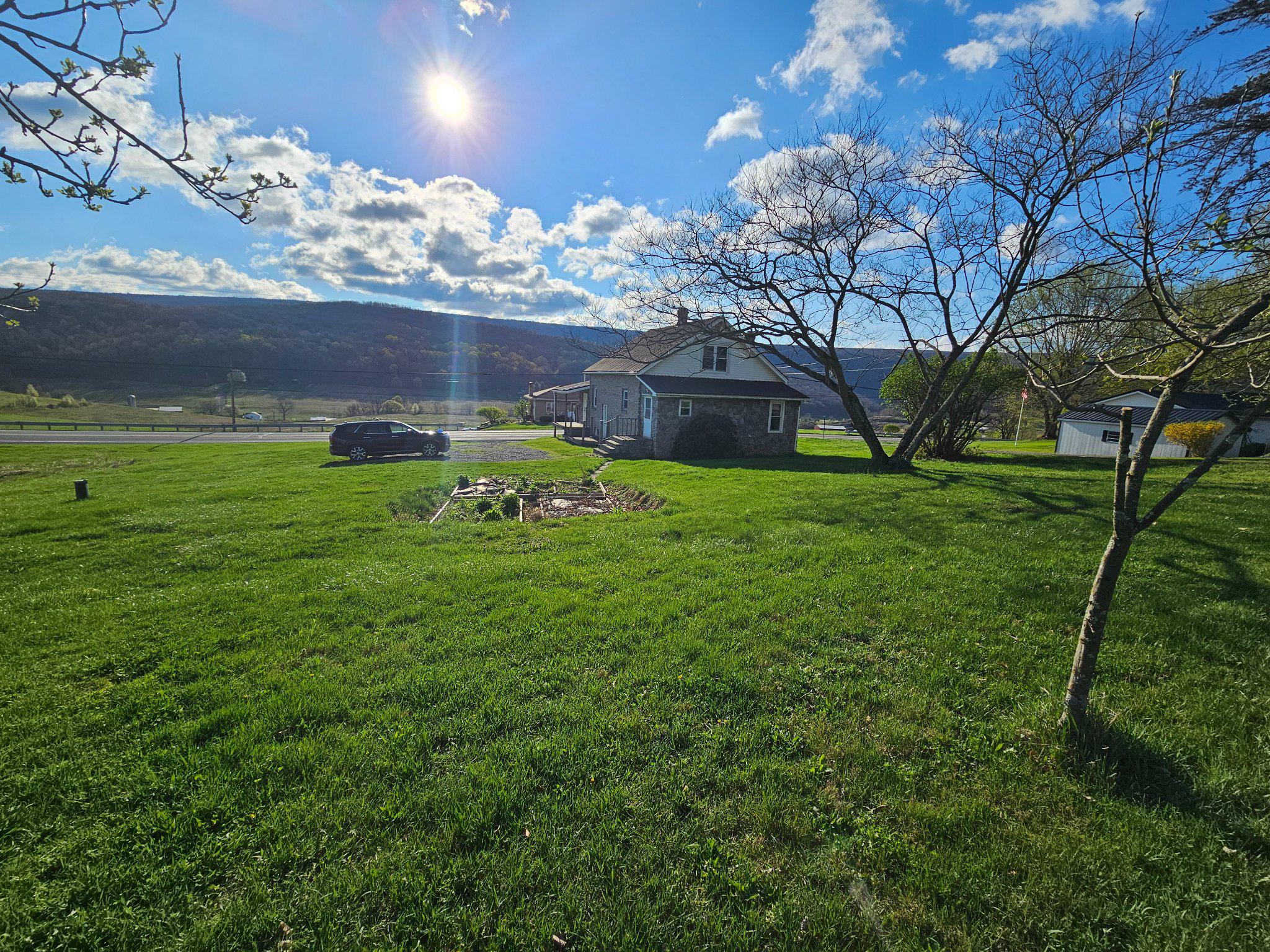 1967 Hyndman Road Hyndman, PA 15545 - Photo 41 of 41 Charming home in a sunlit landscape. (back view)