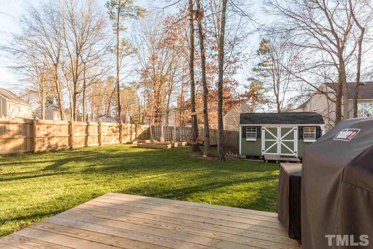 4316 Birmingham Way Raleigh, NC 27604 - Photo 25 of 25 a view of a house with a yard